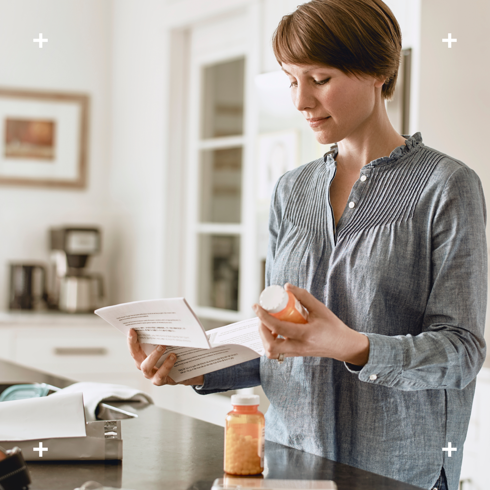 Woman looking at her mail prescription