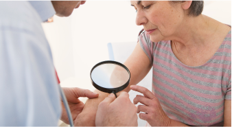 dermatologist with patient