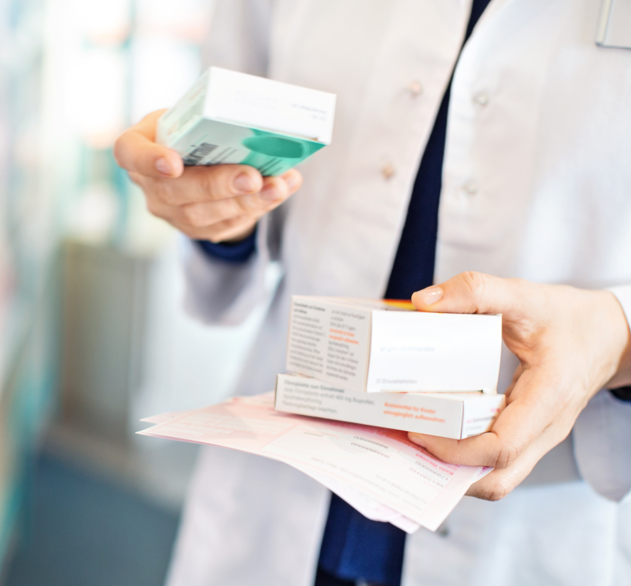 A person holds prescription medications.