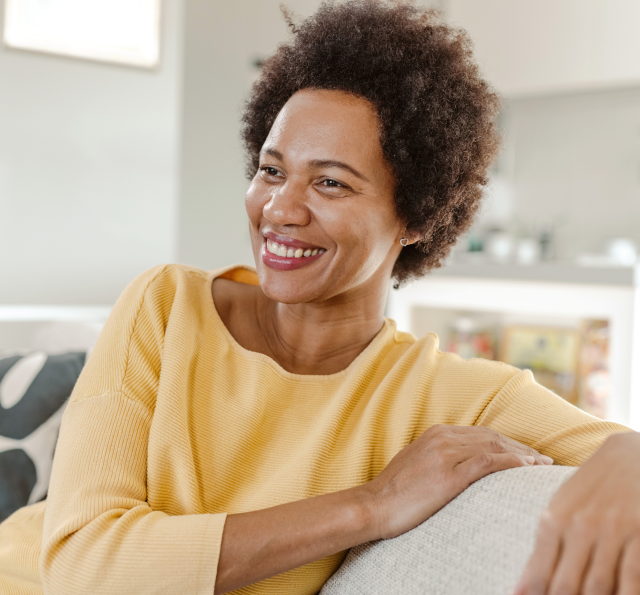 smiling woman relaxing at home