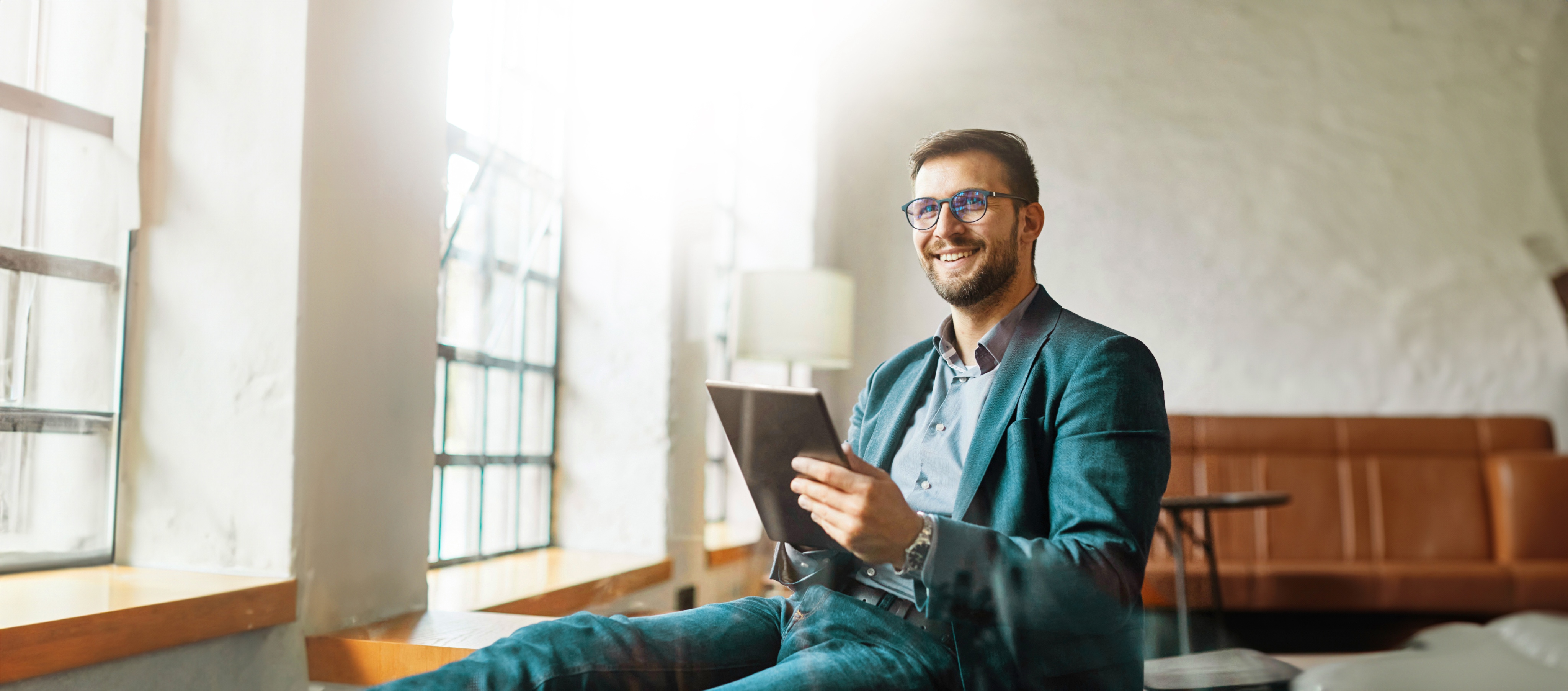 Man sitting with tablet