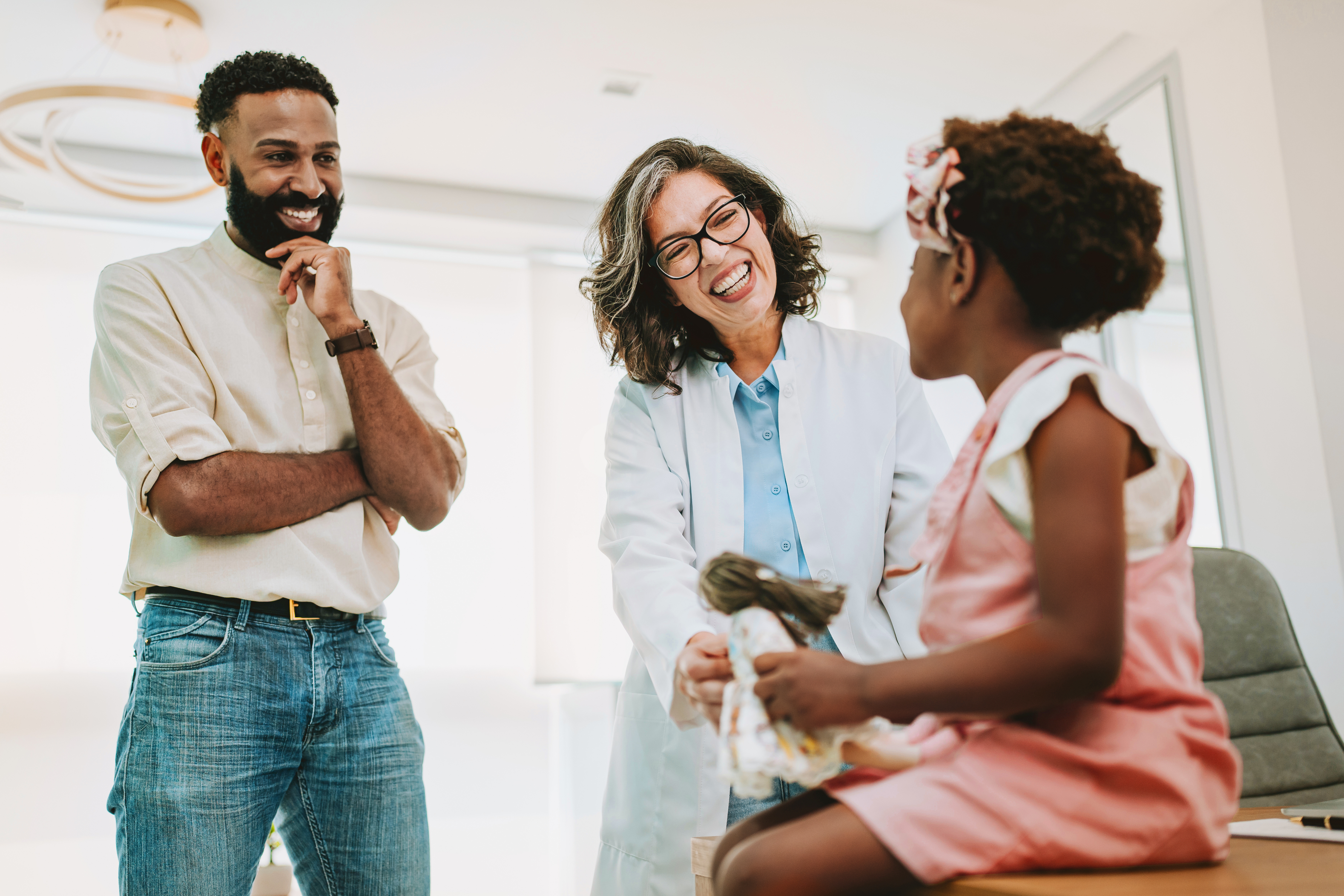 doctor meeting with daughter and father