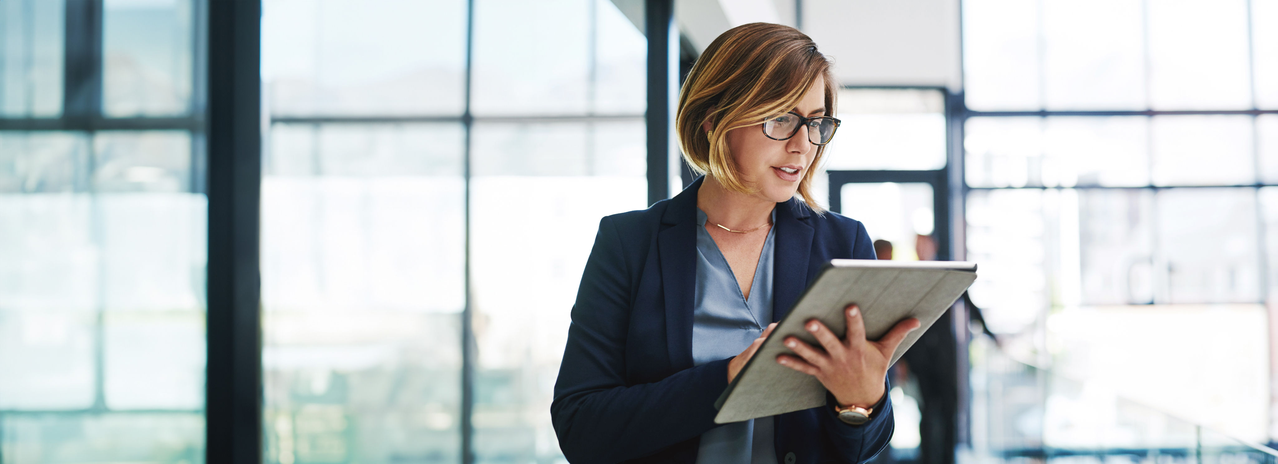 Woman looking at report