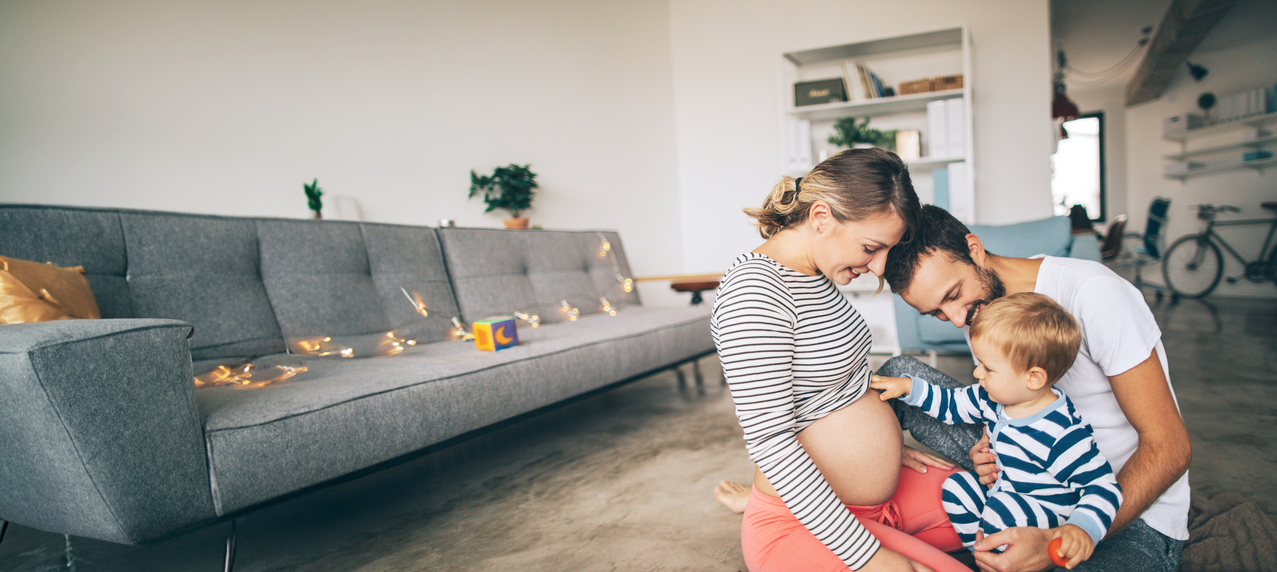 Baby touching pregnant belly