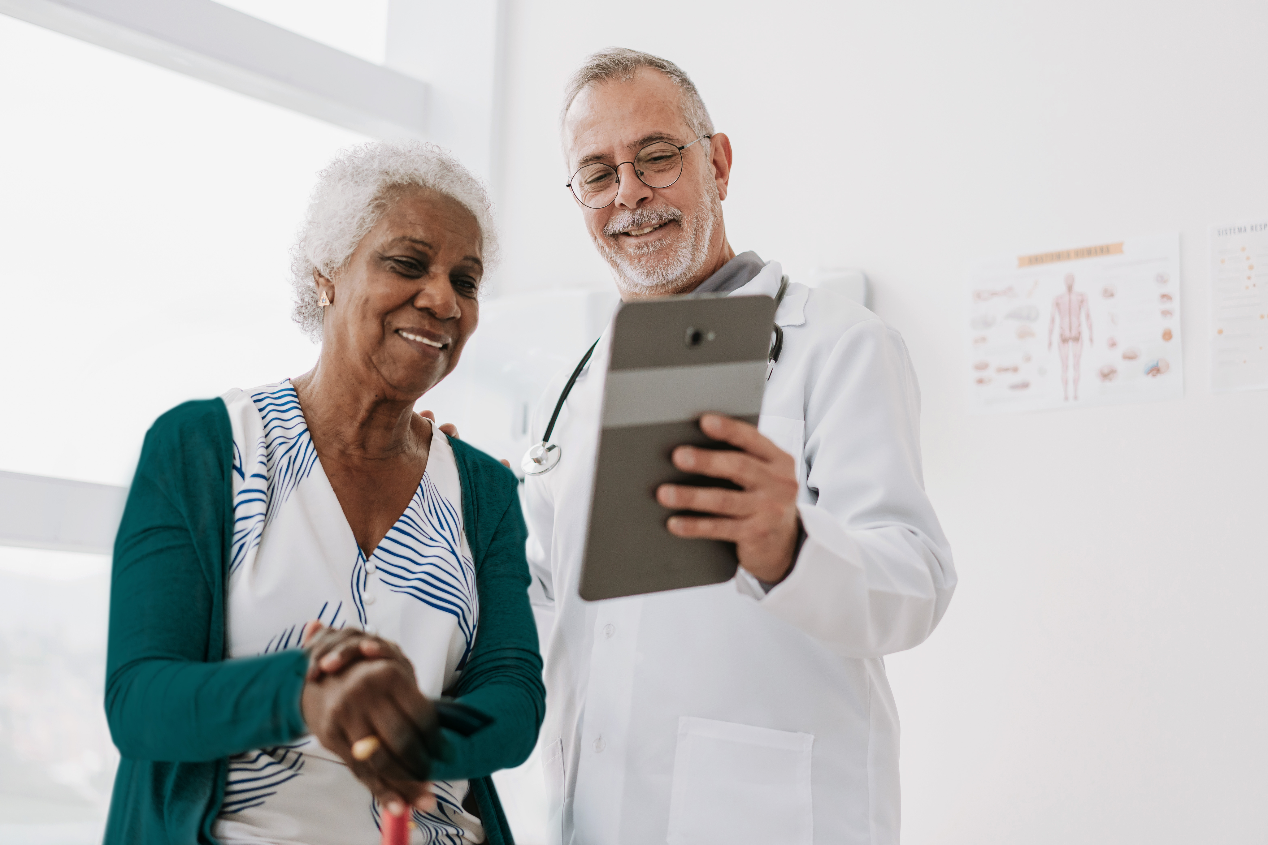 Elderly black woman with Male doctor