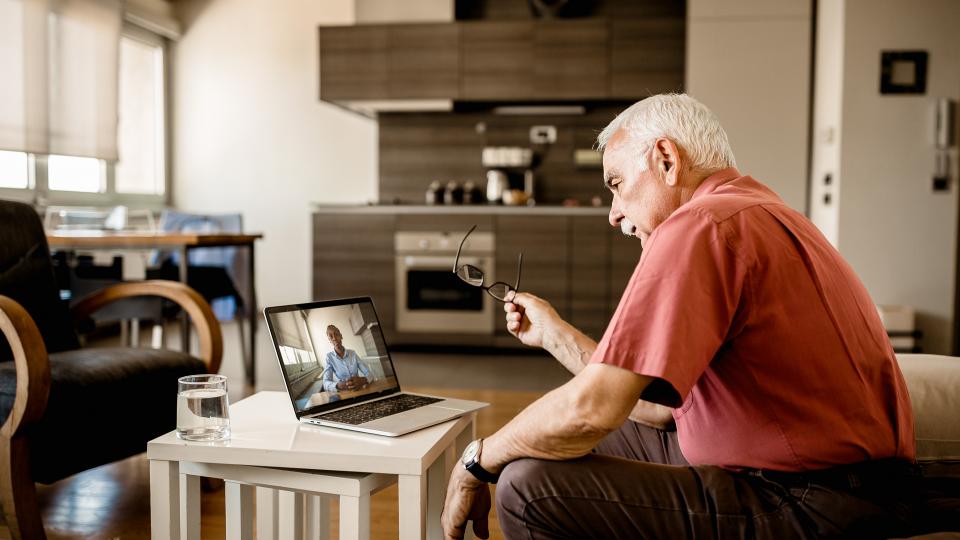 Virtual therapy session via laptop computer