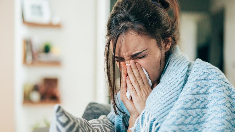 A photo of a woman who has the flu