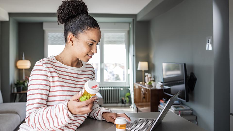 woman holding prescription