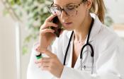 A physician has a phone conversation discussing a medication