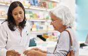 Independent Pharmacist with customer