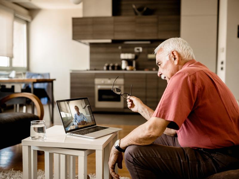 Virtual therapy session via laptop computer