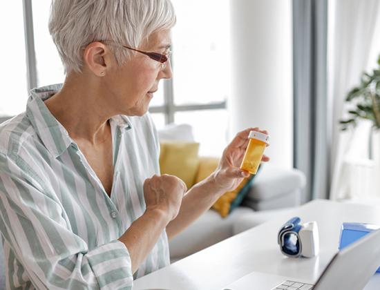 Woman holding prescription