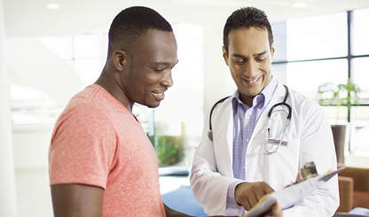 health care provider using tablet to share information with patient