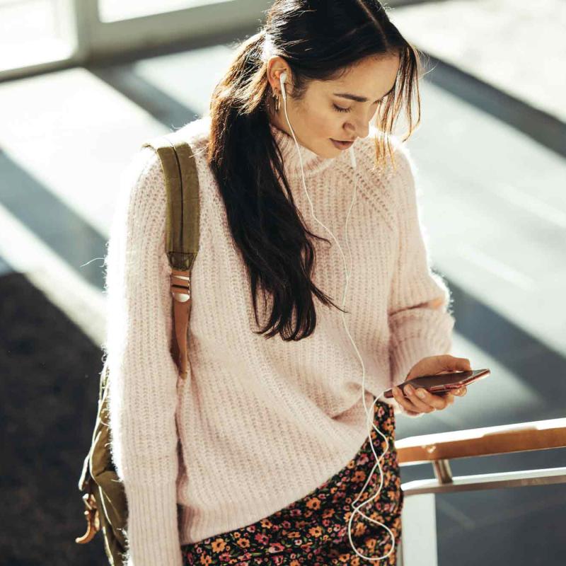 Woman talking to her physician on her mobile device