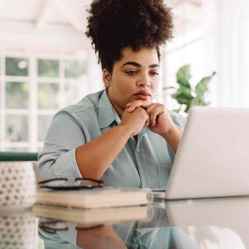 Woman looking at her personal health chart on a computer