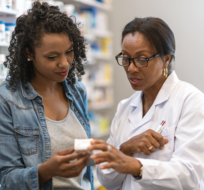 A patient consults with a pharmacist