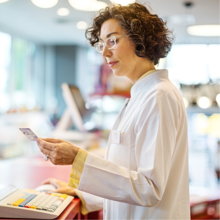 A pharmacist reviews a prescription