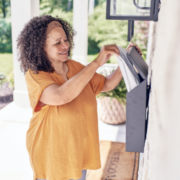 patient at home mailbox receiving medication