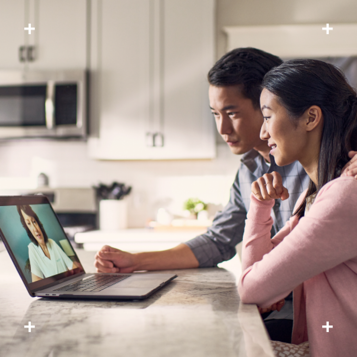 Man and woman in online meeting with healthcare physician