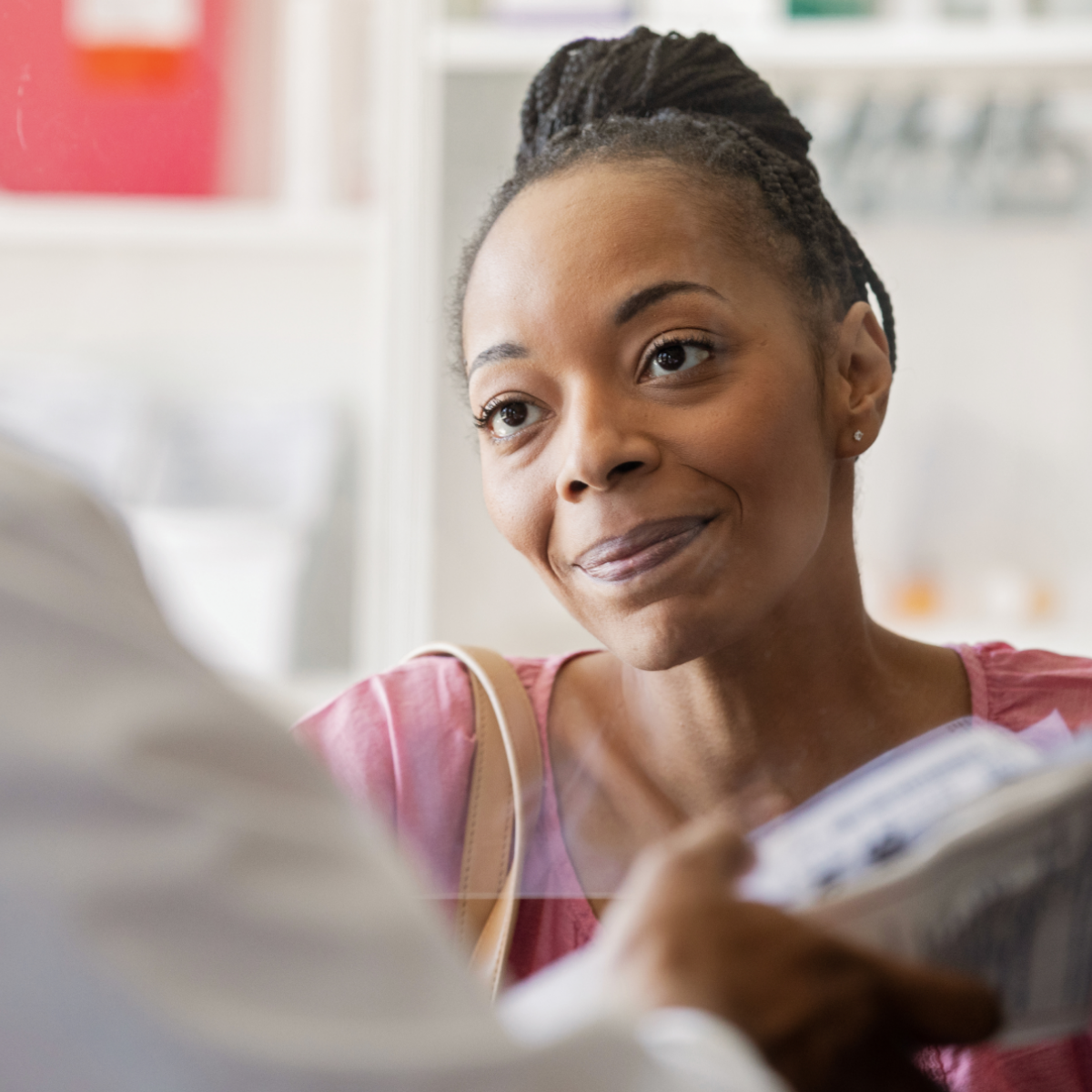 A woman at a pharmacy