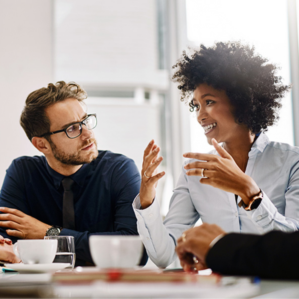 A person presents an idea to colleagues