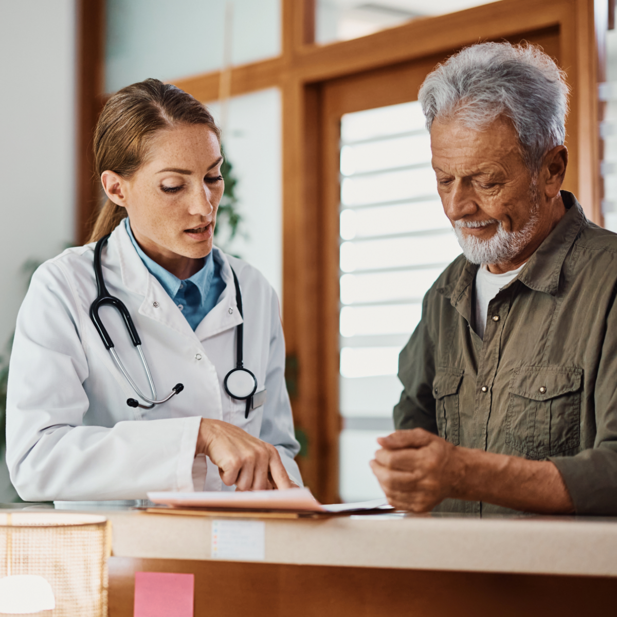 A doctor has a discussion with their patient