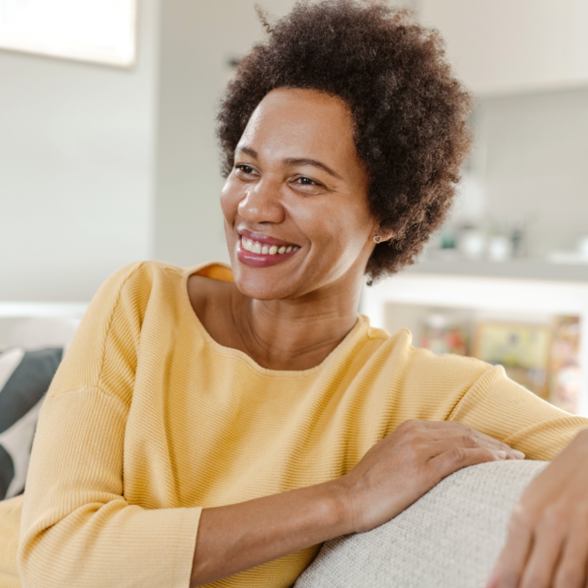 smiling woman relaxing at home