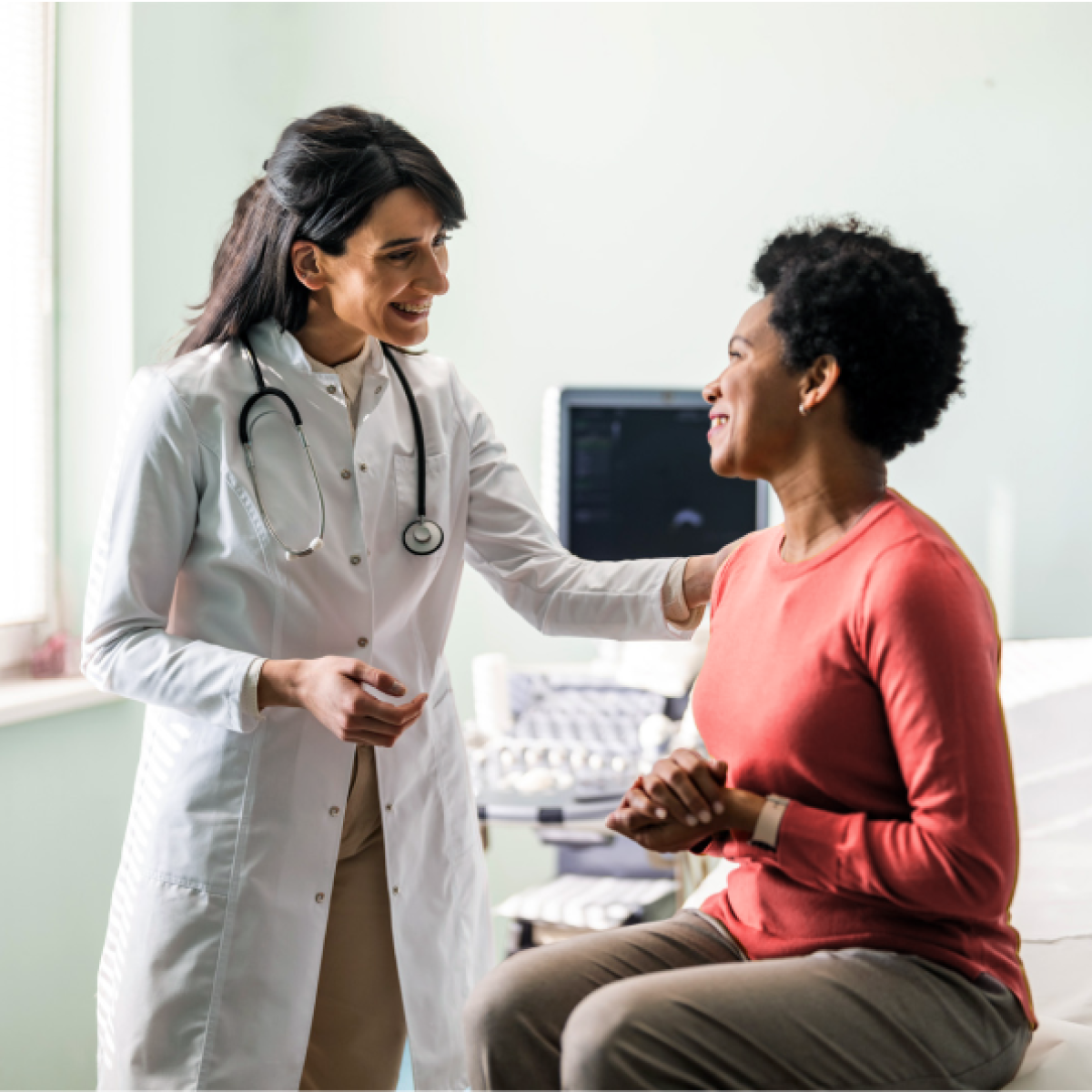 Caring doctor puts patient at ease