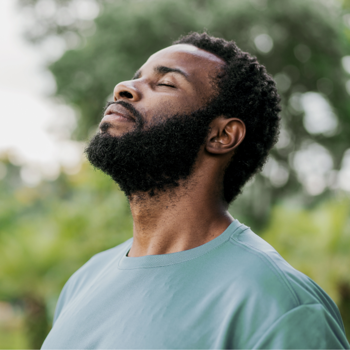 a man takes a deep, cleansing breath