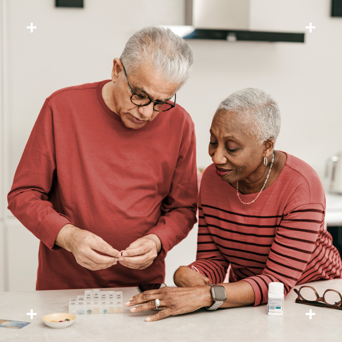 husband and wife organizing their medications